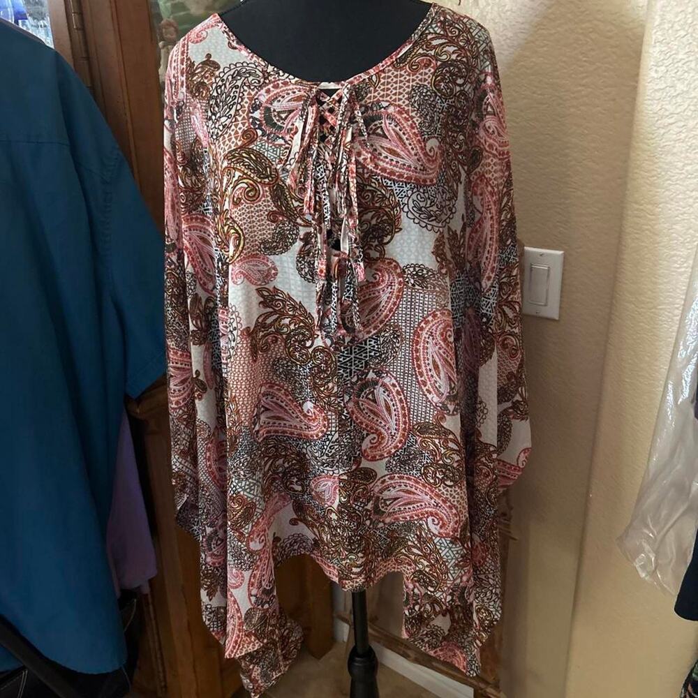 Brown and pink paisley print